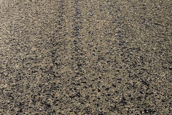 Eski Asfaltın Yakın Görüntüsü Siyah Asfalt Yolu Yüzeyde Asfalt Pürüzleri — Stok fotoğraf