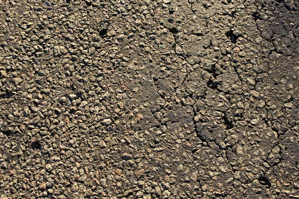 旧沥青的近景 纹理黑色沥青路面 表面擦拭粗糙的沥青 车道纹理 沥青作为抽象的背景 柏油路纹理 — 图库照片
