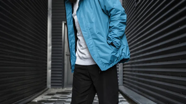 Man in blue jacket. Streetwear. Life style