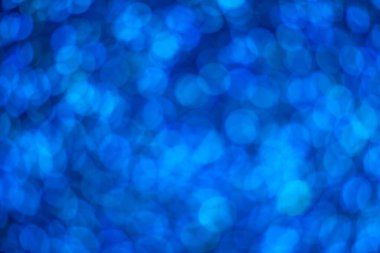 Parıldayan ışık soyut mavi bokeh ışığı bulanık arkaplan 