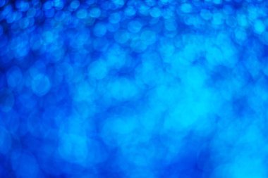 Parıldayan ışık soyut mavi bokeh ışığı bulanık arkaplan