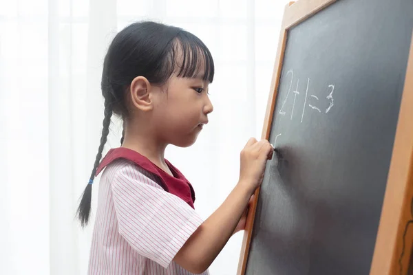 Asian Chinese Little Girl Writing Blackboard Isolated White Background — Stock Photo, Image
