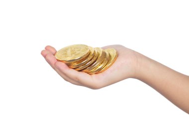 Altın Bitcoin izole beyaz arka planda tutan çocuk el