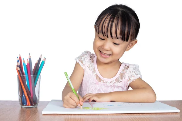 亚洲小中国女孩在纸上画在孤立的白色背景下 — 图库照片