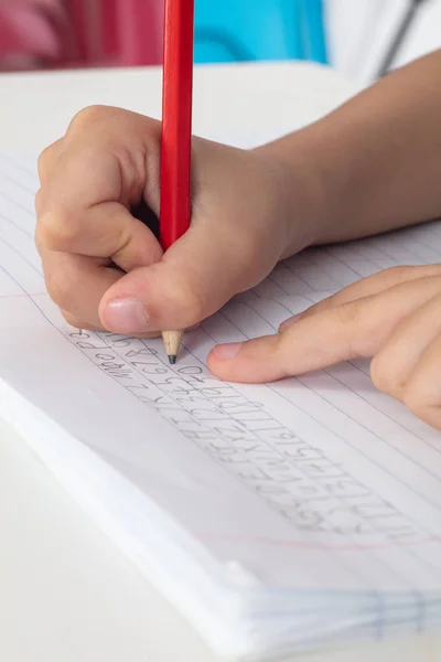 Children Hands Holding Pencil Doing Homework Home — стоковое фото
