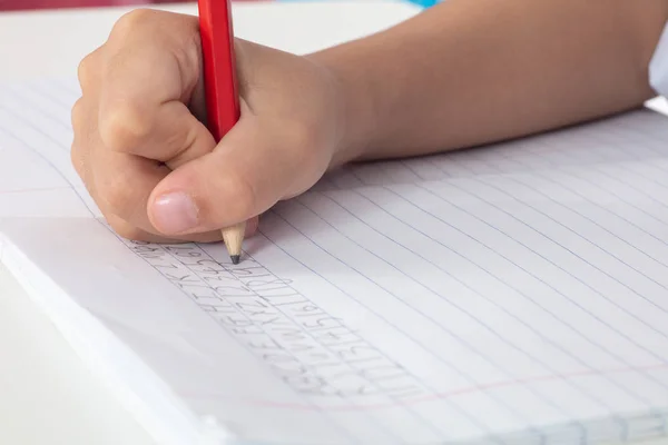 Children Hands Holding Pencil Doing Homework Home — стоковое фото