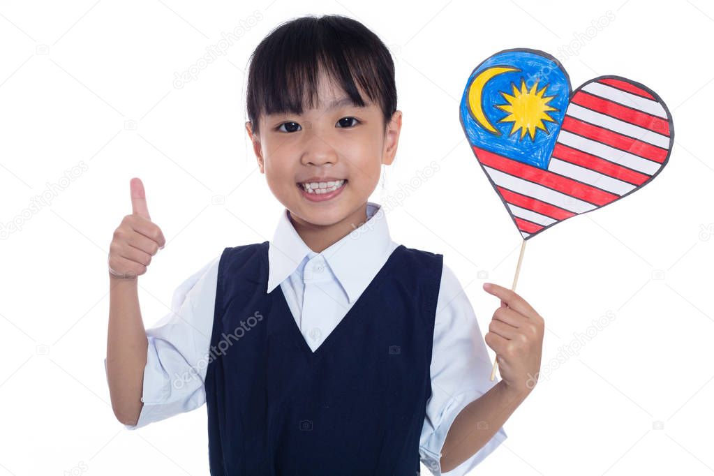 Asian chinese little girl holding Malaysian Flag in isolated white background
