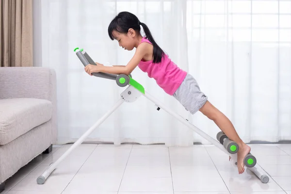 Asian Chinese Little Girl Playing Workout Machine Living Room Home — Stock Photo, Image