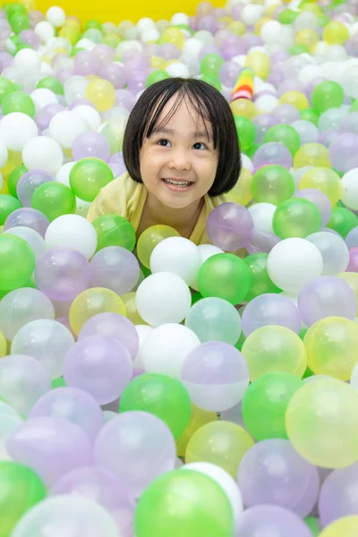 Asian Chinese little Girl Playing At Balls Pool — ストック写真
