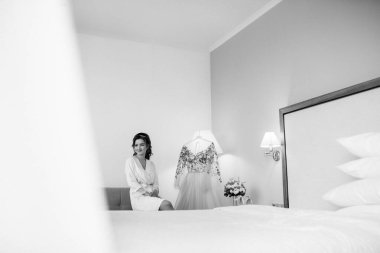 morning of the bride with the creation of the image of makeup and the creation of hairstyles