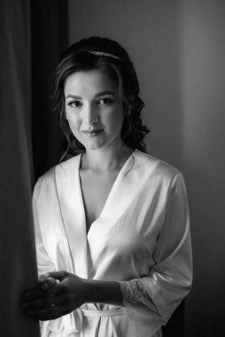 morning of the bride with the creation of the image of makeup and the creation of hairstyles