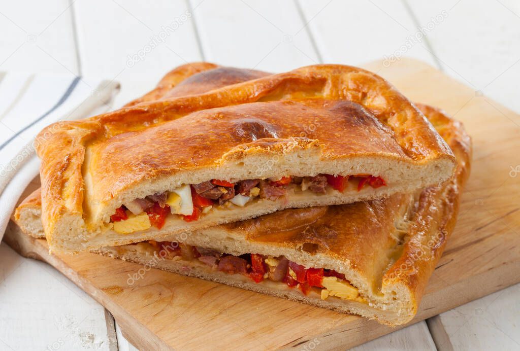 Spanish meat pie filled with chorizo, egg and bell pepper.