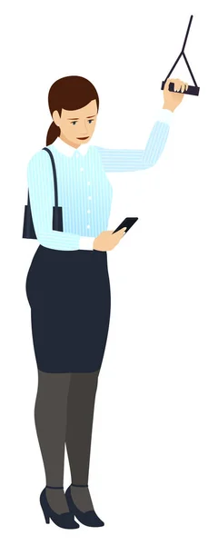 A business woman looks at a smartphone in public transport, standing and holding the handrail, on the way to work or after work, home. isolated vector — Stock Vector