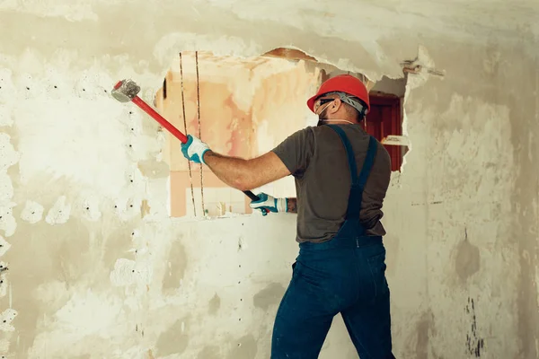 Builder Hammer His Hands Breaks Cement Wall Builder Dressed Protective — Stock Photo, Image