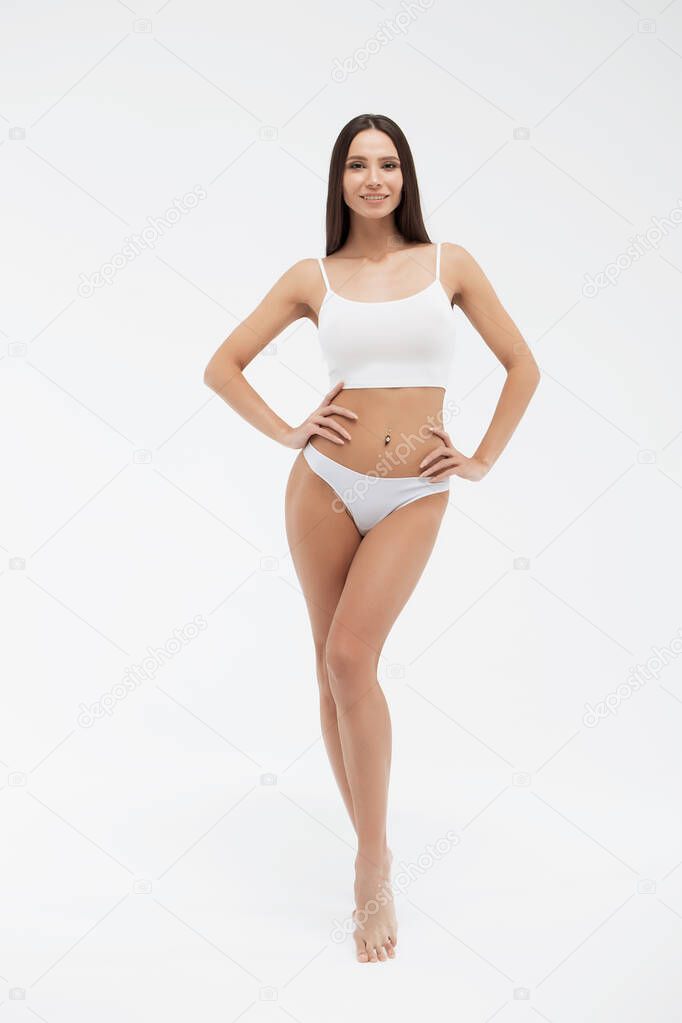 Sensual woman in underwear looking at camera alluringly