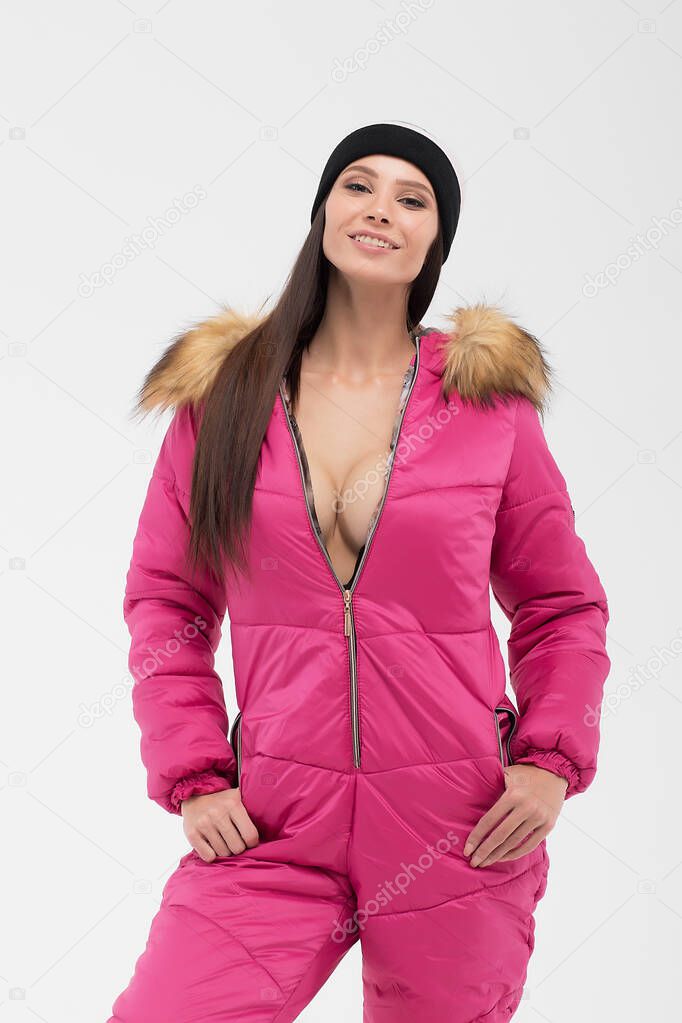 Attractive woman in snowboarding outwear