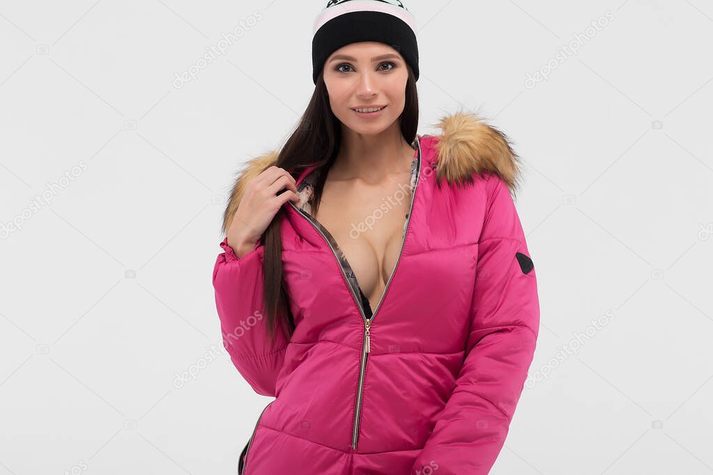 Attractive woman in snowboarding outwear