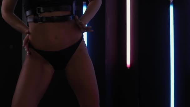 Fit woman in lingerie dancing in nightclub — Stock Video