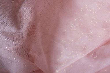 Elegant rose gold glitter background, sparkling, festive, shimmering.