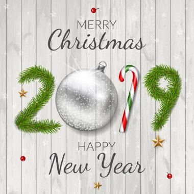 Ahşap arka plan üzerinde neşeli Noel ve mutlu yeni yıl 2019 tebrik kartı.