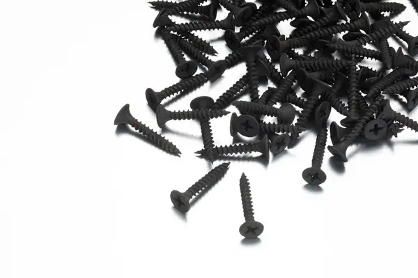 Black screw on white background — Stock Photo, Image