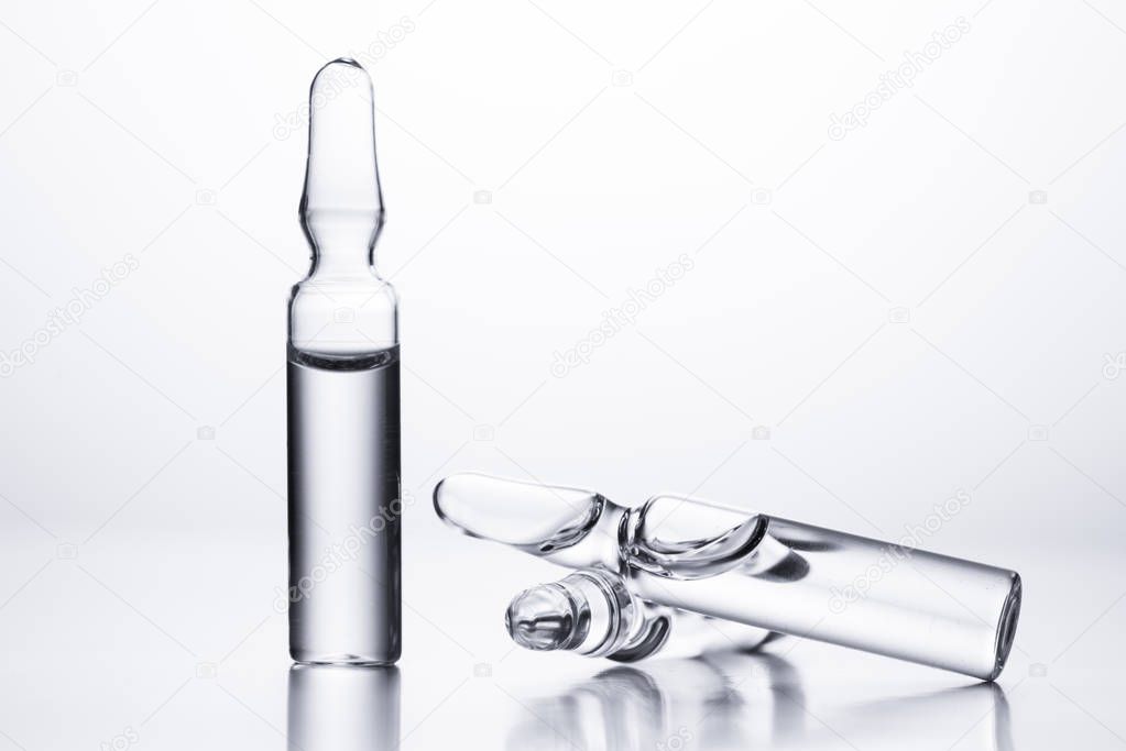 Medical ampules for injections on a white background.