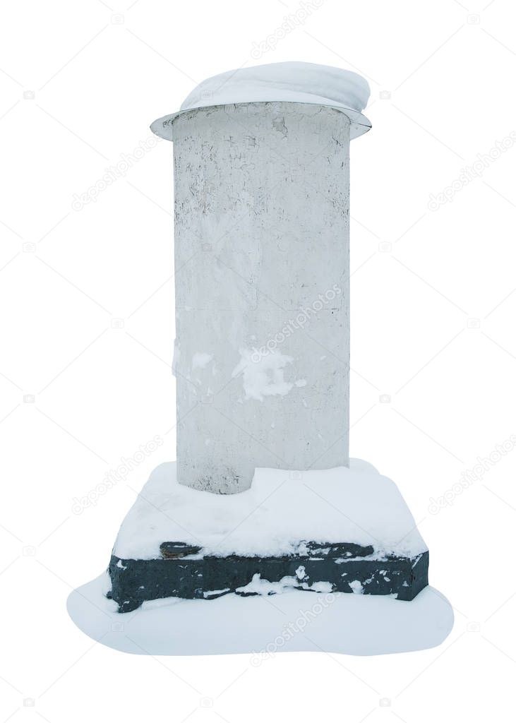 Old advertising column with a snow cap