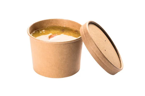 Soup in a disposable cup of craft paper