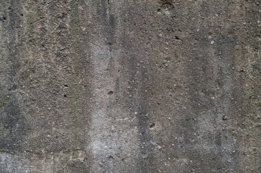 Kısmen ayrılıkçı katmanlı gri Beton arka plan.