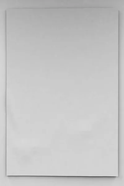 Empty vertical banner or blank of 2x3 size on a white wall — Stock Photo, Image