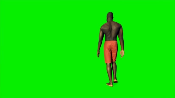 Афроамериканец в шортах, идущий против Зеленого экрана, 4K — стоковое видео