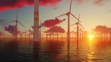 Güzel gün batımına karşı offshore yel değirmenleri, denizaşırı uçuş