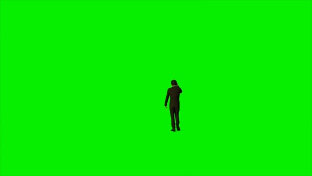 Businessman talking on mobile phone against green screen, Luma Matte attached, 4K — Stock Video