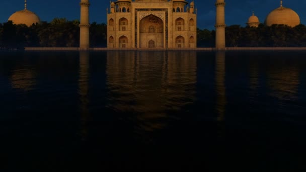 Taj Mahal ao amanhecer com belas reflexões lago — Vídeo de Stock