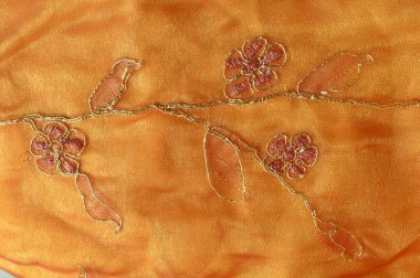 Sarı tekstil işlemeli düğün geçmişi. 