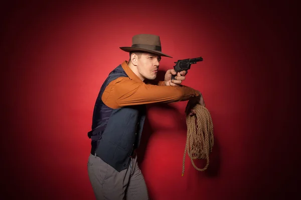 cowboy with a pistol, a gold miner adventure guy in a hat with a gun