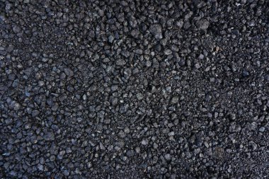 Siyah doku. Taş kara duvar. Soğutulmuş siyah lav. Kaya dokusu. Taş zemin. - Evet. Taş dokusu. Kaya yığını arka planı. Sert yapı minerali                               
