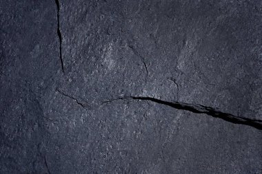 Koyu gri kayrak arkaplan veya doku.                                