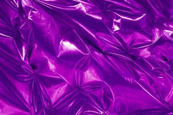 Pürüzsüz menekşe ipeği veya saten dokusu arka plan olarak kullanılabilir                               