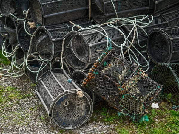 Modern plastic fish and crab traps ashore. Fishing industry.