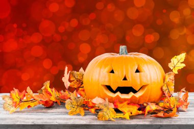 Renk arka planda turuncu korkunç kabak ile Halloween kart şablonu 