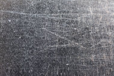 Grunge doku, ahşap arka plan üzerinde siyah cila çizik