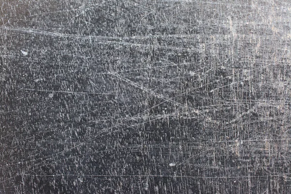 Grunge doku, ahşap arka plan üzerinde siyah cila çizik