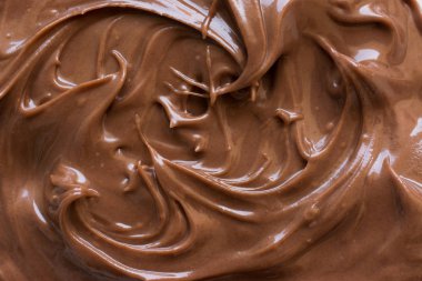 Çikolatalı fındık plaka üzerine yayıldı. Kadar yakın ve arka plan