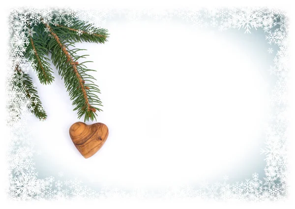 Christmas postcard. Background with ornaments for greeting card, wooden heart and love, space for text