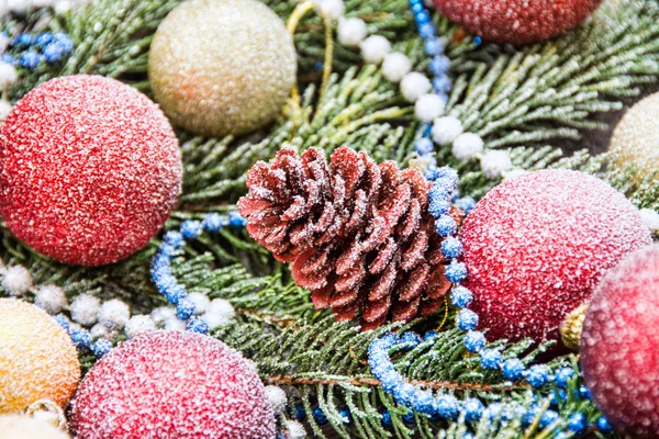 Christmas Decoration Baubles Branches Fir Tree Wooden Background Snowfall — Stock Photo, Image