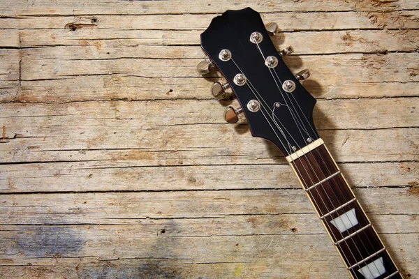 Close Van Elektrische Gitaar Liggend Vintage Hout Achtergrond Met Kopie — Stockfoto