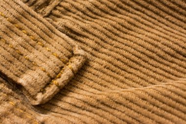 Kadife pantolon dokusu, pamuklu kumaş. Cep ve perçin. Tekstil ba