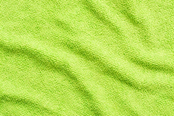 Superficie de tela de microfibra verde, fondo de patrón macrotextil — Foto de Stock