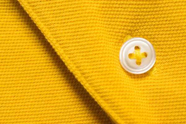 Żółta Koszulka Polo tekstura, tkanina bawełniana. Tło tekstylne — Zdjęcie stockowe